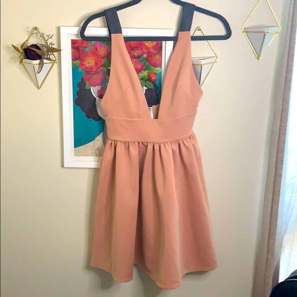 Blush mini dress with faux leather straps